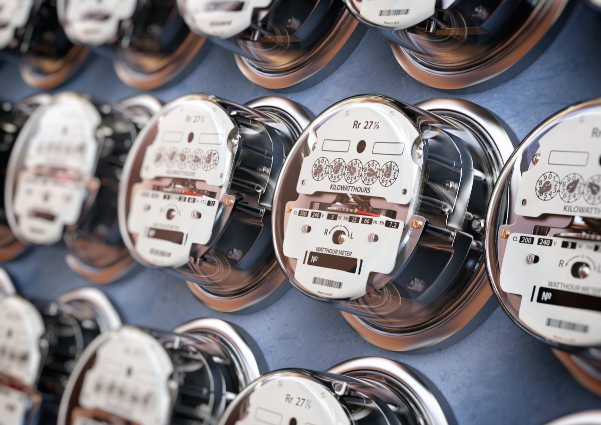 Electric meters in a row measuring power use. Electricity consum